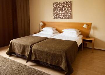 Фото номера Двухместный номер с 2 отдельными кроватями Отель Original Sokos Hotel Koljonvirta г. Ийсалми 6